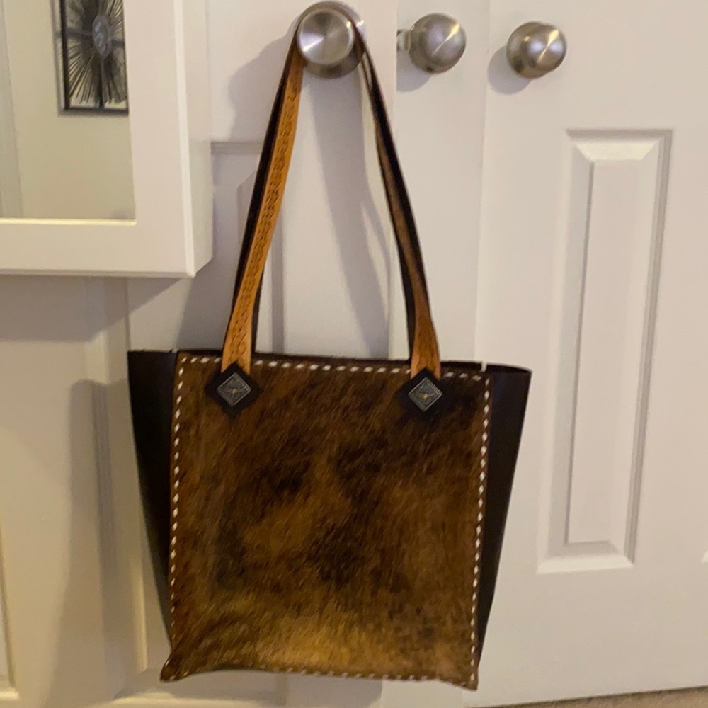 Genuine hair on hide and leather, hand stitched bag